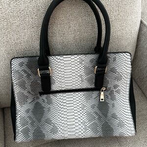 Elegant Black and Silver Handbag